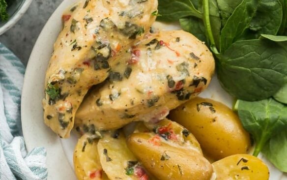 italian crockpot chicken and potatoes on plate