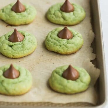 mint hershey kiss cookies on baking sheet
