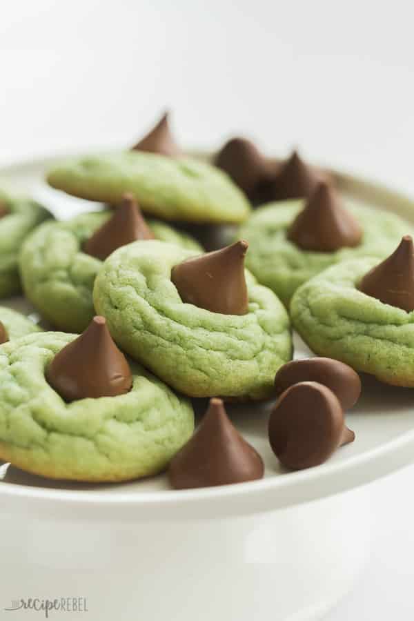 hershey kiss cookies on white tray with extra hershey kisses