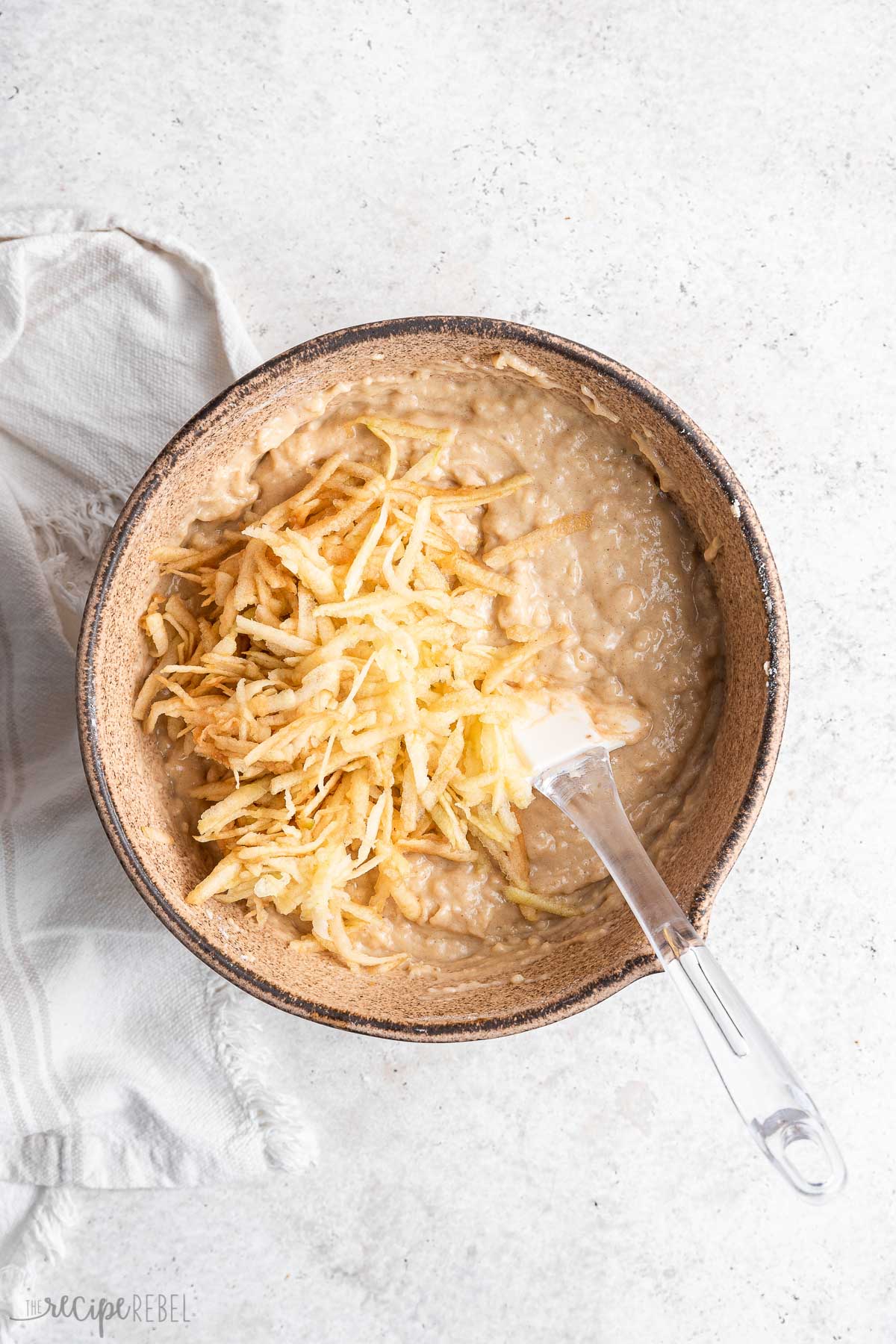 shredded apple stirred into baked donut batter.