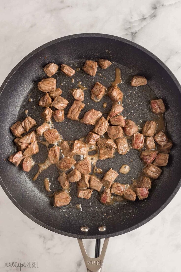 browned beef cubes in skillet