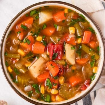 close up image of instant pot vegetable soup in a bowl