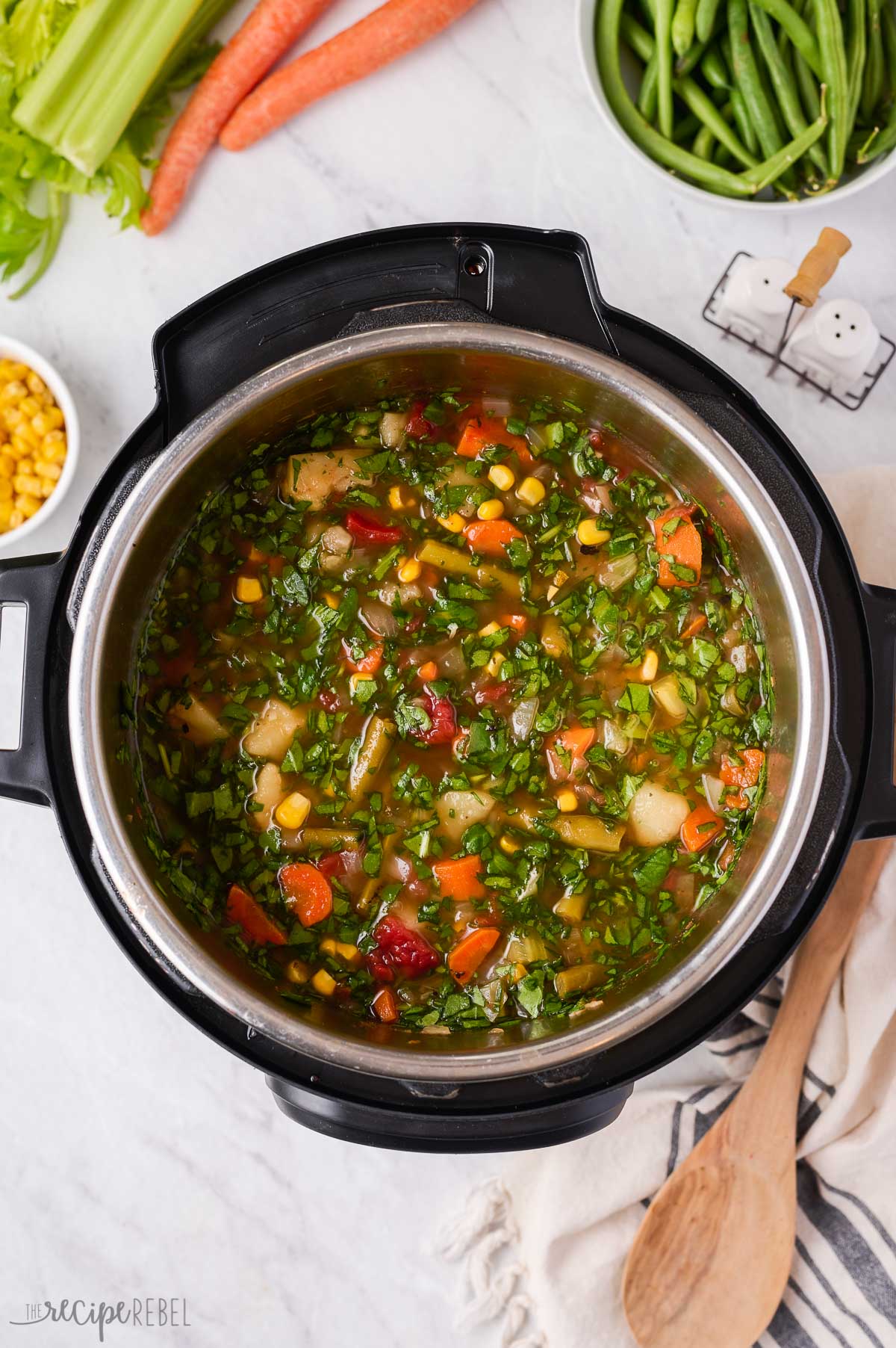 overhead image of instant pot vegetable soup in pressure cooker