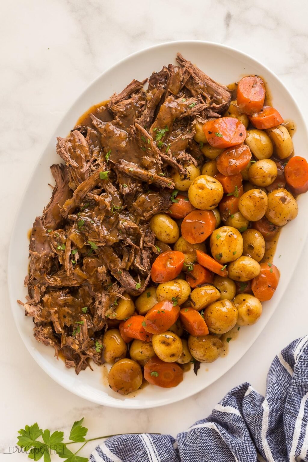 Slow Cooker Pot Roast with the BEST gravy! (VIDEO) - The Recipe Rebel
