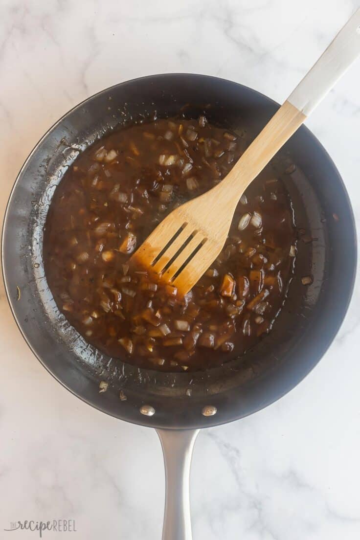 slow cooker pot roast gravy simmering in pan