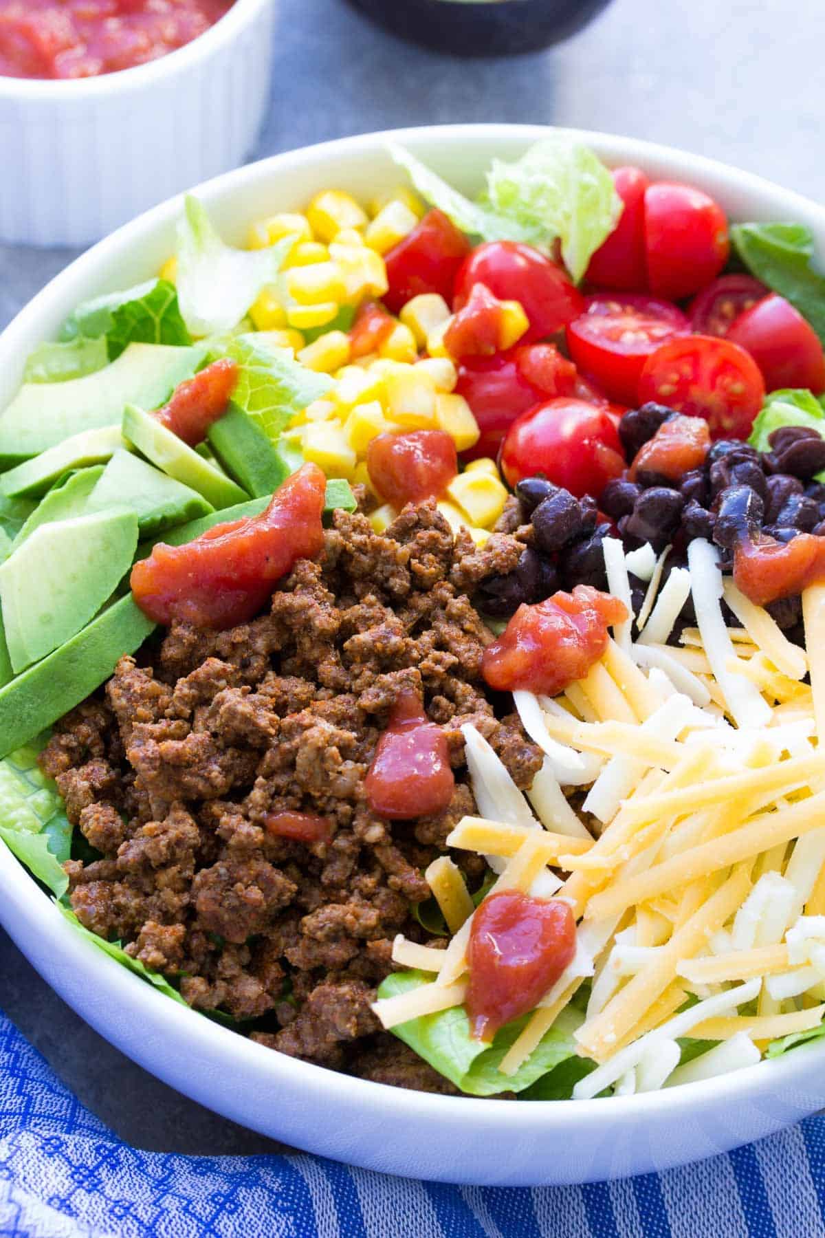 20 minute taco salad with avocado fresh tomatoes corn black beans and cheese