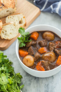 instant pot beef stew in white bowl