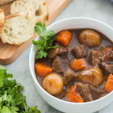 instant pot beef stew in white bowl