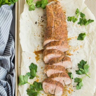 roasted pork tenderloin oven sliced on pan