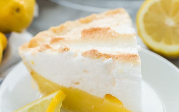 lemon meringue pie slice on white plate