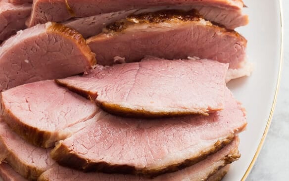 pressure cooker ham on white platter