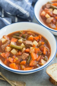 crockpot vegetable soup in a white bowl