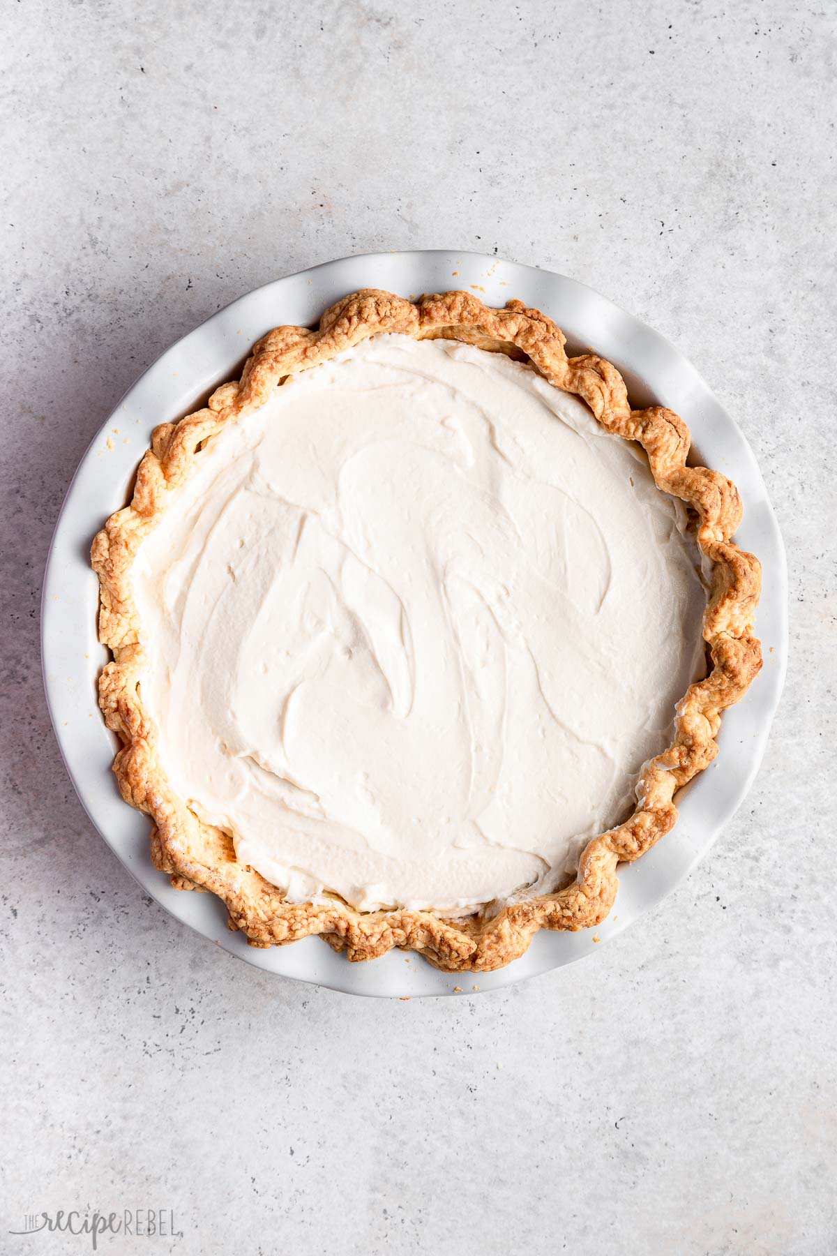 cream cheese filling spread into prebaked pie crust.