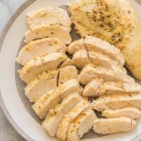 instant pot chicken breast sliced on grey plate