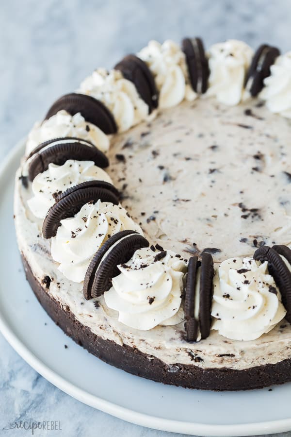 no bake oreo cheesecake whole on white plate