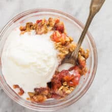 strawberry rhubarb crisp overhead bowl with ice cream