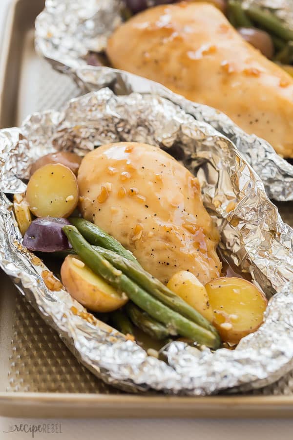 honey garlic chicken foil packets close up on pan