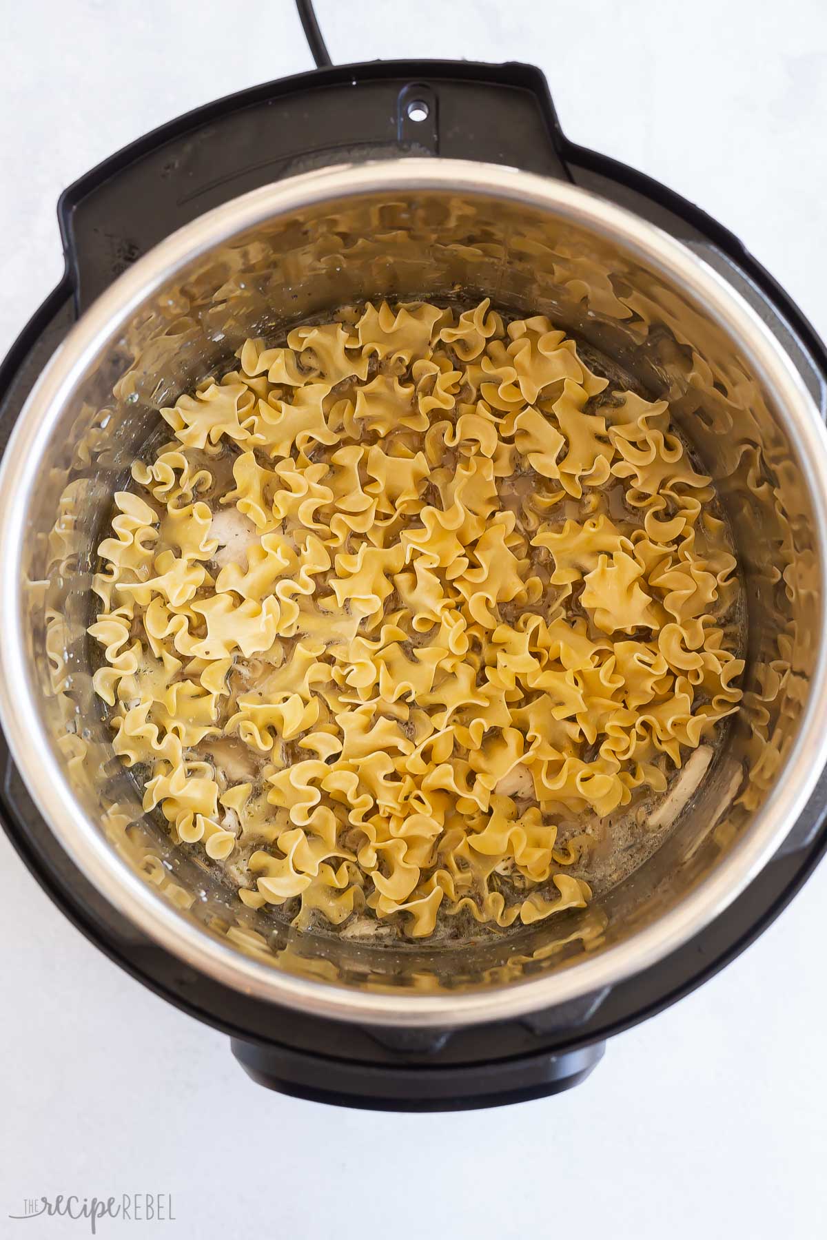 egg noodles added to instant pot.