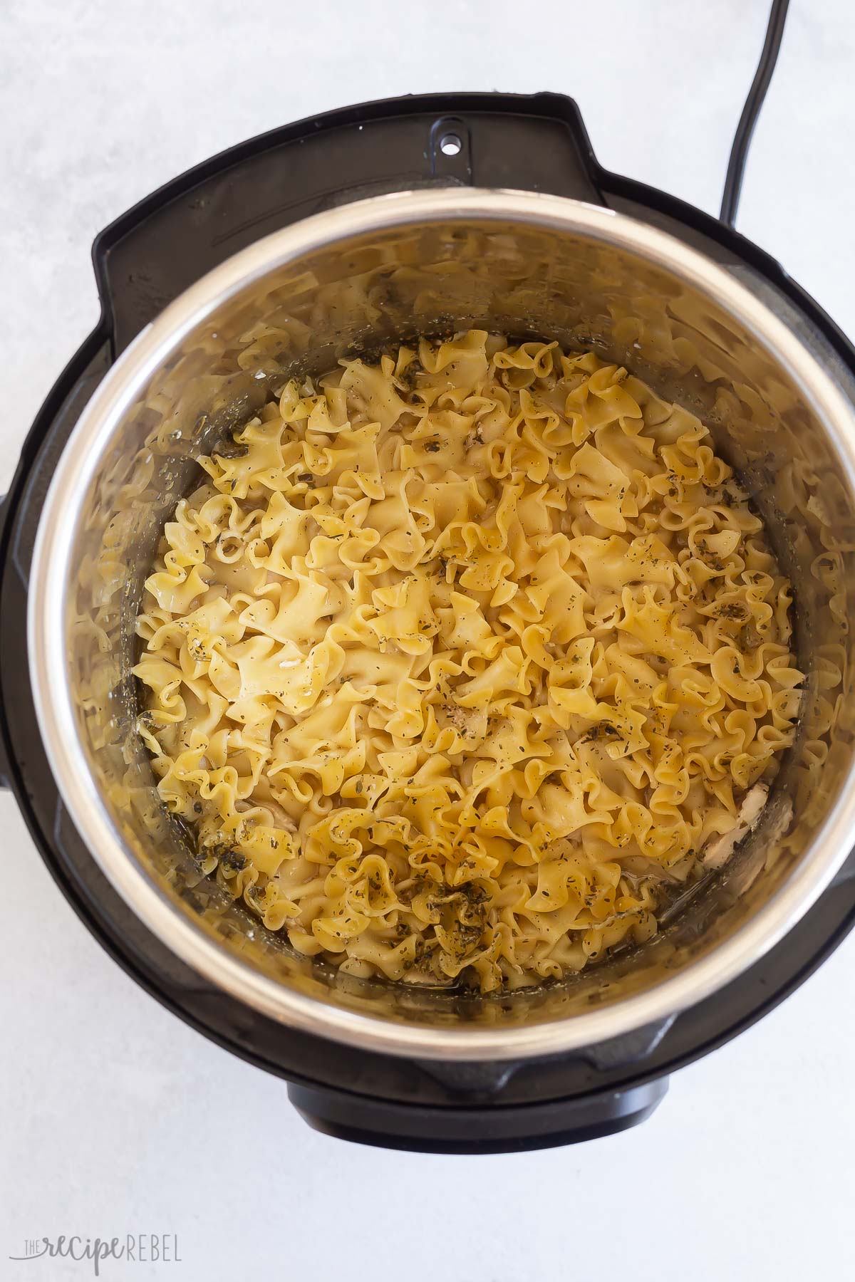 instant pot egg noodles cooked and ready to stir.