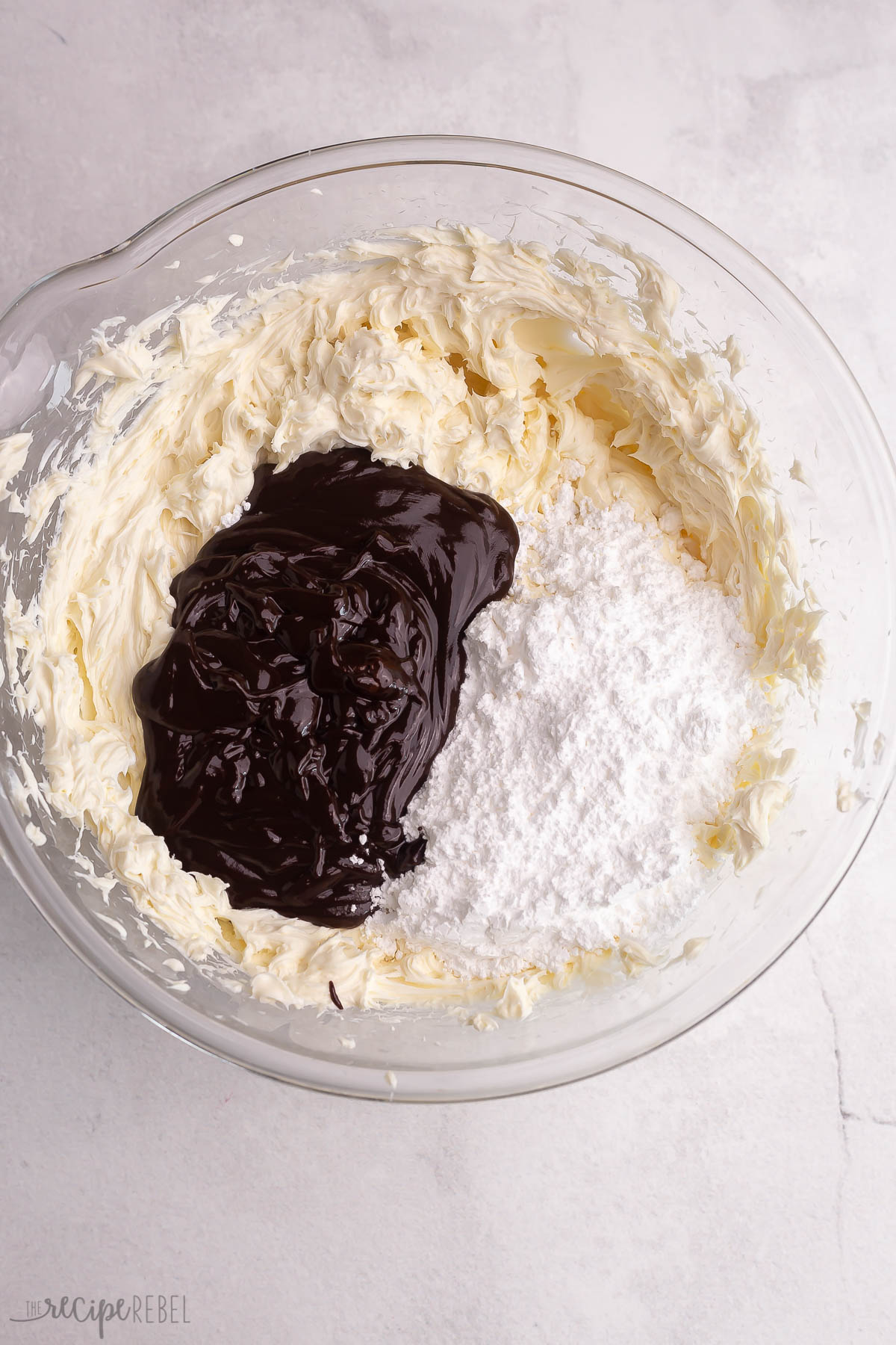 melted chocolate and powdered sugar added to cream cheese.