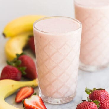 strawberry banana smoothie in clear glass