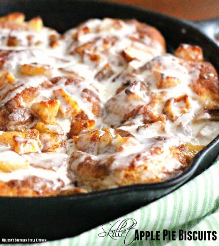 skillet apple pie biscuits in cast iron with glaze on top