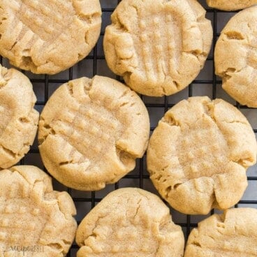 square overhead image of peanut butter cookies on cooling rack.