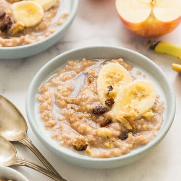 slow cooker oatmeal in blue bowls