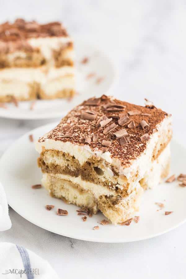 close up slice of easy tiramisu recipe on white plate with chocolate shavings