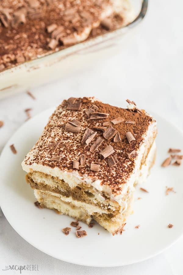 tiramisu recipe slice on plate on white background