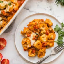 baked cheese tortellini on white plate