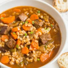 beef barley soup in bowl close up