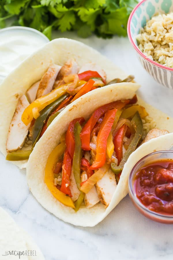 slow cooker chicken fajitas in tortilla shell