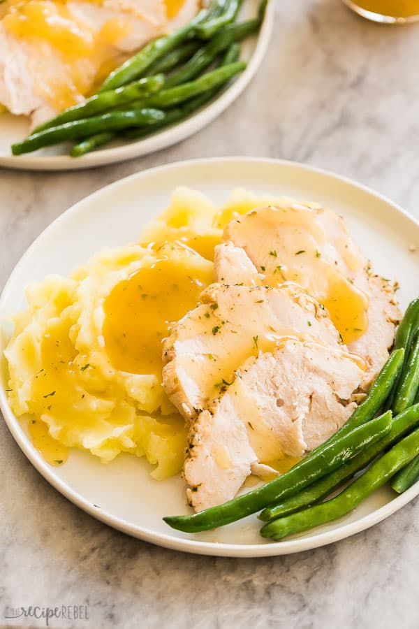 crockpot turkey breast sliced with mashed potatoes gravy and green beans