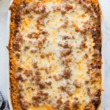 overhead image of pan of lasagna in white baking dish.