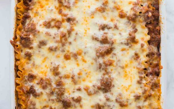 overhead image of pan of lasagna in white baking dish.