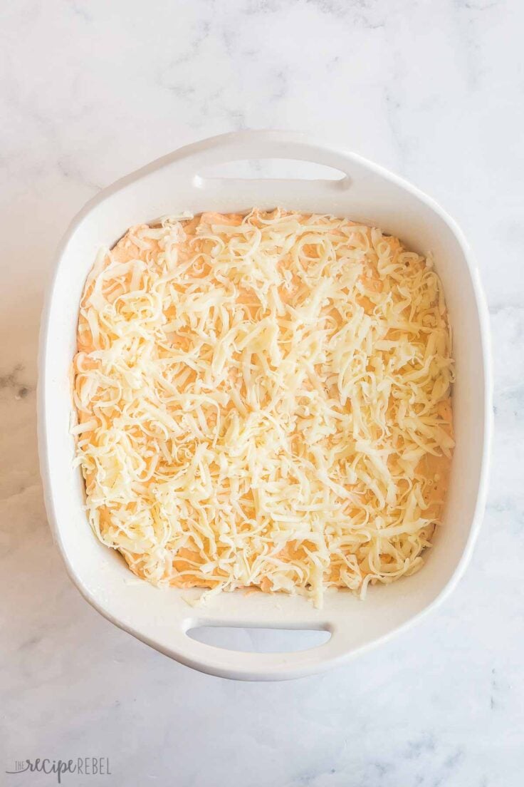 spread into a baking dish and top with shredded mozzarella
