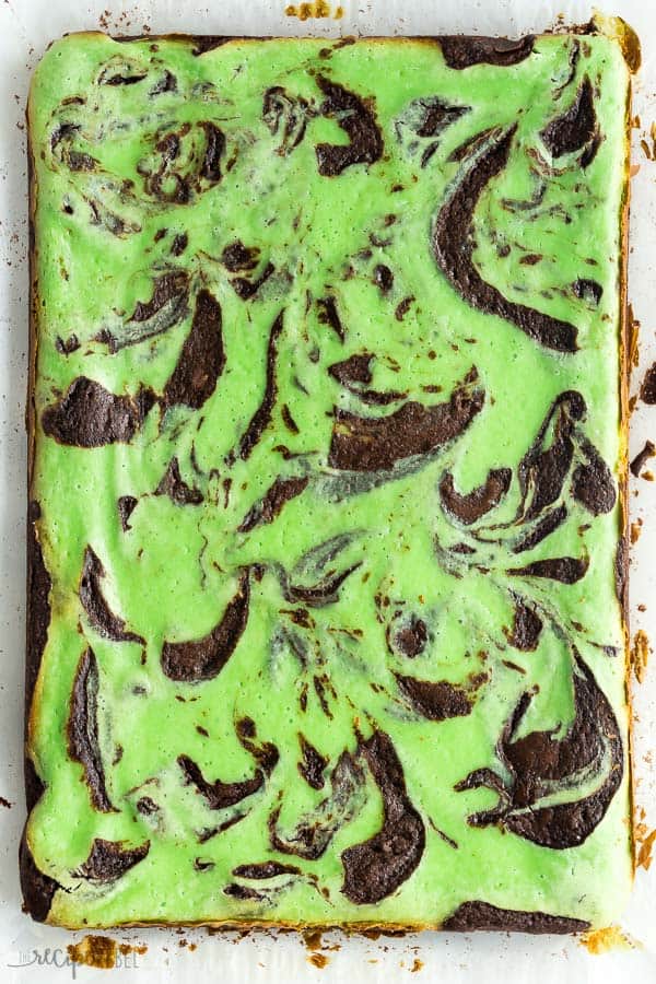 mint cream cheese brownies whole on piece of parchment paper