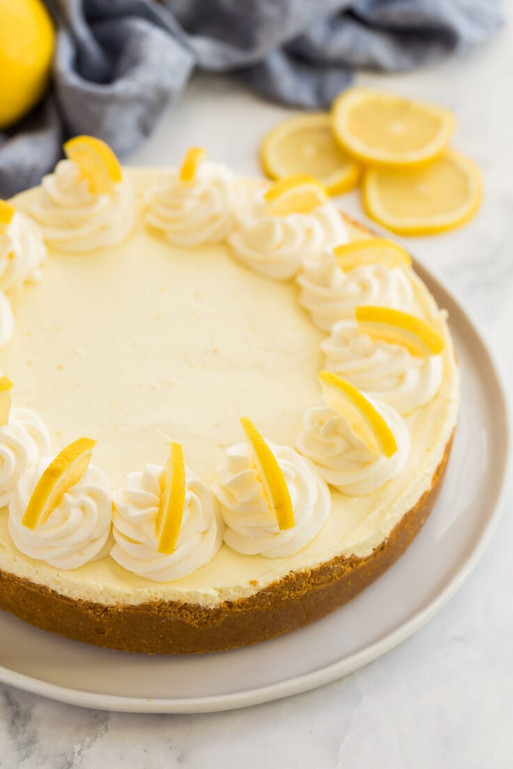 whole no bake lemon cheesecake with whipped cream