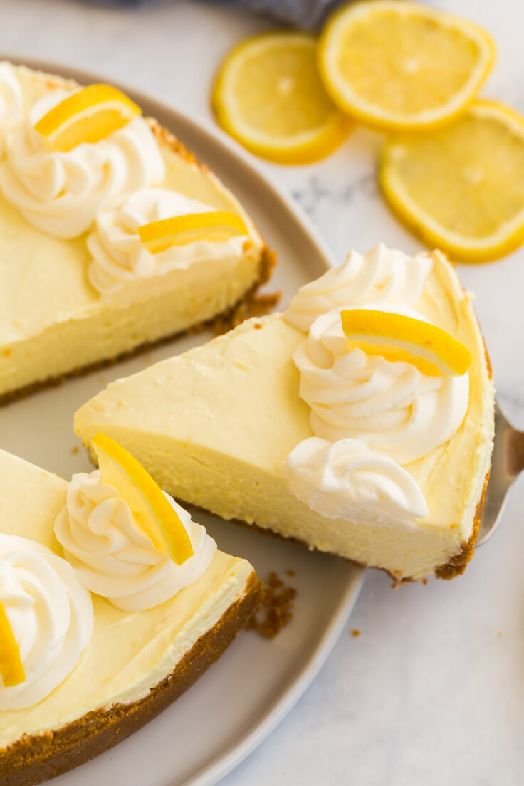 slice of lemon cheesecake being pulled out