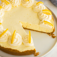 featured image of no bake lemon cheesecake with slice missing