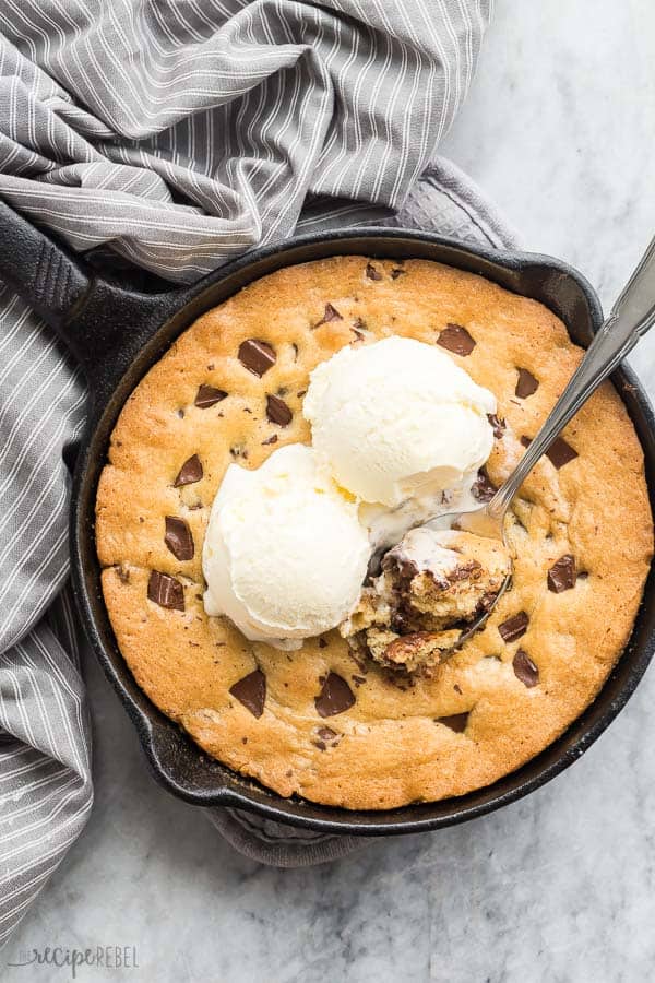 pizookie overhead with two ice cream scoops and spoon digging in