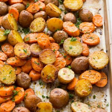 roasted potatoes and carrots on pan