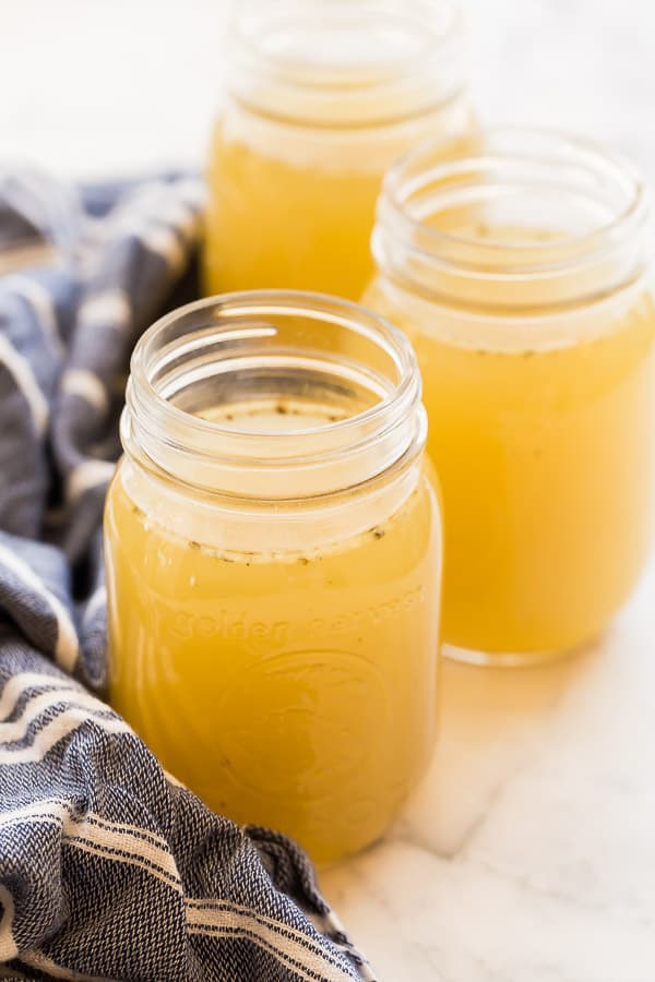 how to make turkey stock  in glass jars with blue towel