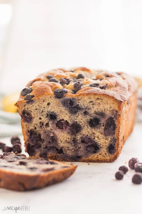 blueberry banana bread with one slice cut close up