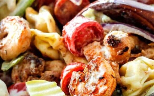 Close up of spicy shrimp and veggies in a Po'boy pasta salad.