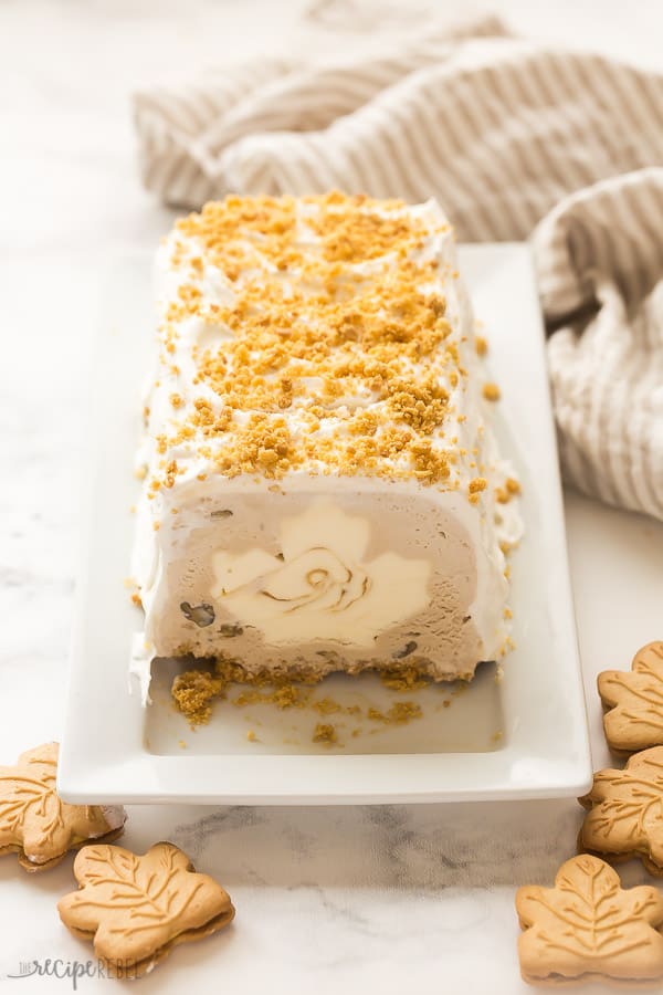 maple ice cream cake on white plate with white background and maple cookies