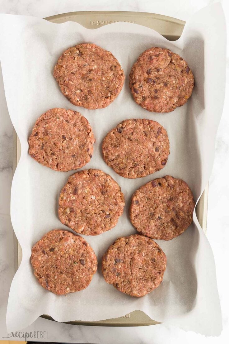 These are the BEST Burgers! Made with a mix of ground beef and ground pork, caramelized onions, balsamic vinegar, chili powder and MORE that makes them so much more flavorful than other burgers! #burger #hamburger #grilling #recipe #dinner shape burgers and place on sheet pan to chill or freeze