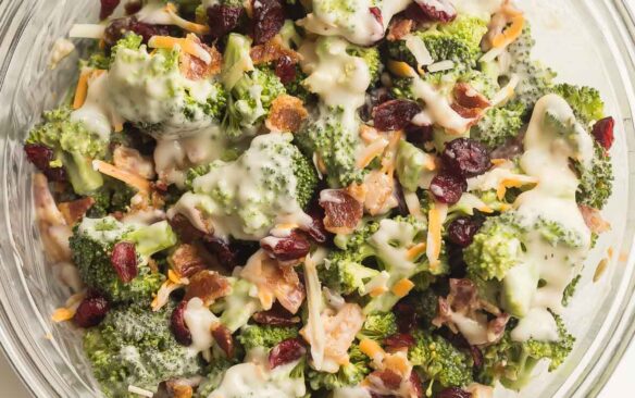 broccoli salad recipe with bacon cranberries cheese and homemade dressing.