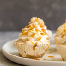 caramel praline ice cream cupcakes up close with grey background